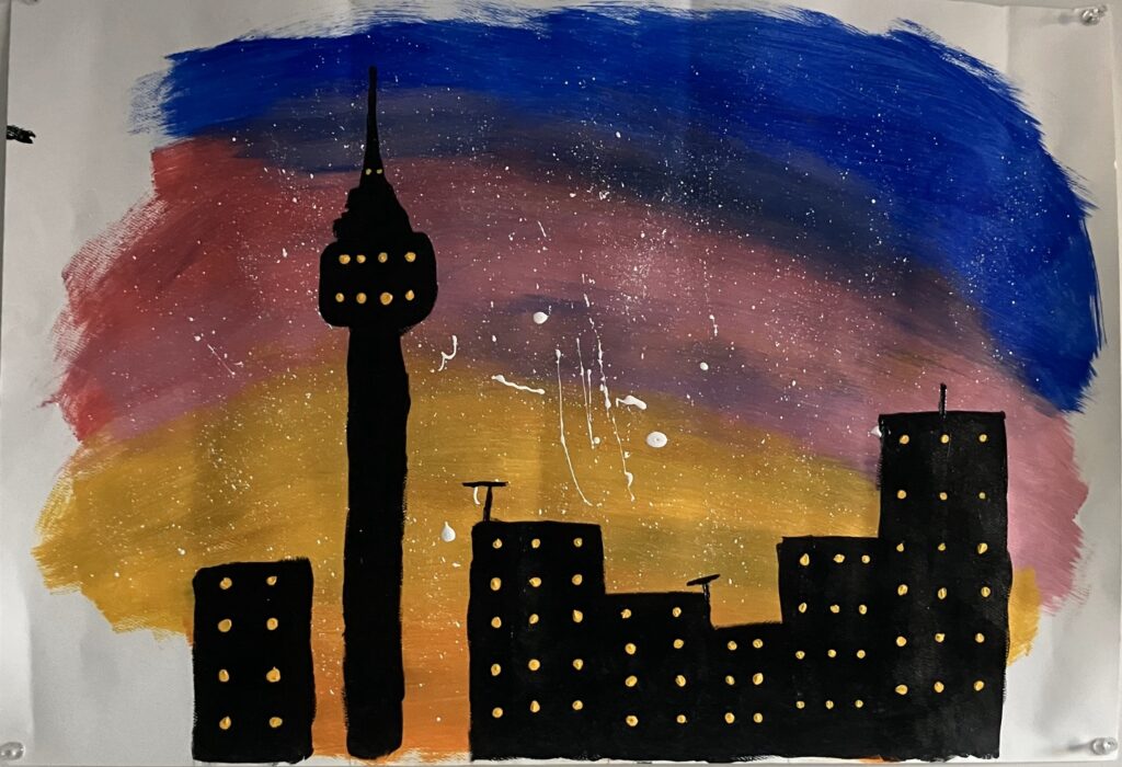 Painting mimicking a city skyline at sunset