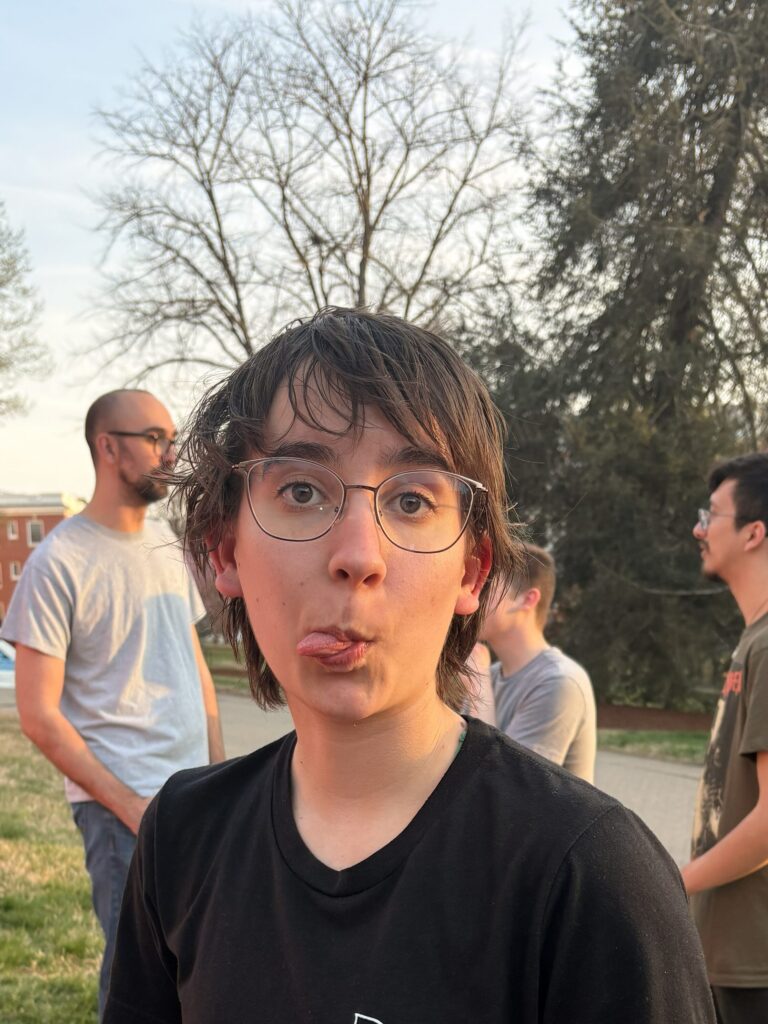 Lexi with sweaty bangs after painting outside in the heat.