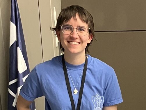 Lexi smiling with bangs that aren't yet at her eyebrows.